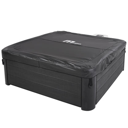 Black hot tub cover with a visible MSpa brand logo on a square framed portable jacuzzi spa with black wood-like exterior.